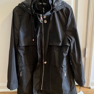 Black Calvin Klein lightweight lined jacket with detachable hood. NWT.